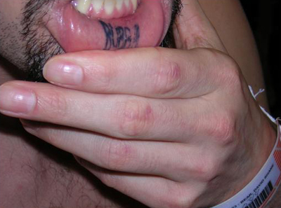 Word “Bubba” Tattooed Inside Suspected Gang Member’s Mouth