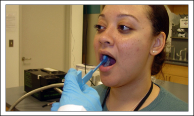 Buccal Collection Procedure: Foam Applicator in Mouth