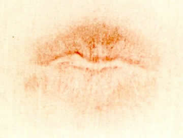 Photograph of a latent lip print.