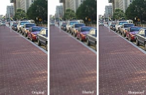 Figure 1 is a series of three side-by-side photographs of the same line of cars parked along a city curb. The left is the original, the middle is blurry, and the right shows a sharp photograph with the appearance of artifacts.