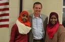 FBI Boston Special Agent in Charge Vincent B. Lisi (center) recently attended a meeting at the Somali Community and Cultural Association. More than 100 community members and youth were at the event, including the two young ladies pictured above, who hope to join the FBI when they are older. 