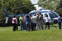 Chicago Citizens’ Academy participants celebrated their graduation with a day at the FBI range, where they watched demonstrations (including one by this Bureau helicopter) and fired weapons.