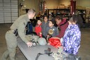 On December 16, 2014, fourth-grade students from Primitivo Garcia Elementary School in Kansas City, Missouri toured the FBI Kansas City Field Office, where they tried on FBI gear, learned how to gather fingerprint evidence, and met the special agent bomb technician and a member of the SWAT team.