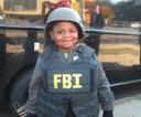 In October 2013, the Little Rock Field Office participated in Community Helpers Day at Fair Park Early Childhood Center. Students learned about how the FBI operates in the community and participated in a handcuffing demonstration, sat in a SWAT vehicle, and were allowed to try on and hold ballistic vests, helmets, shields, and battering rams.