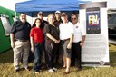 Employees from the FBI’s New Orleans Office took part in a National Night Out event on October 14, 2012. Members of the New Orleans SWAT team and other FBI volunteers (above) spent time with families answering questions, distributing outreach materials, and displaying FBI gear and weapons. 