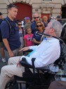 Members of the FBI New York community outreach team speak with NYPD Detective Steven McDonald (in wheelchair) at a 9/11 Memorial walk, held on September 7, 2014. The walk was in honor of FDNY Chaplain Father Mychal Judge, who died during the terrorist attack at the World Trade Center.  