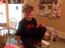 FBI Junior Special Agent Sean Cadden, age 10, who is battling leukemia, wears an FBI hat and shirt given to him by the FBI New York Division before heading to the hospital on November 1, 2014 to receive a bone marrow transplant from his sister, 12-year-old Marijane. The children’s father is Newburgh (New York) Police Department Sergeant Pat Cadden.