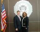 On November 20, 2013, FBI Phoenix Field Office Special Agent in Charge Douglas G. Price (left) announced the division’s 2013 recipient of the Director’s Community Leadership Award, Maraion Douglas. Ms. Douglas is the founder and CEO of MOMA’s House—a local refuge for victims of domestic violence and sex trafficking. 