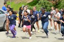 Fifth grade students participating in FBI San Diego Division’s 11-week Teen Academy race to finish the FBI fit test for special agents, which includes timed pushups, sit ups, and a 300-meter run. 