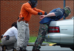 Agents conducting mock arrest exercise