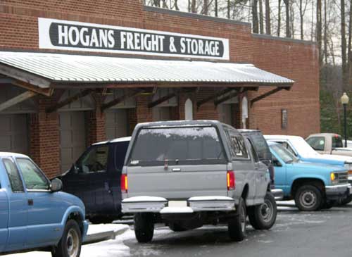 Cars outside Hogan's Freight and Storage